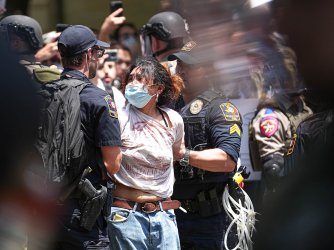 At the University of Texas at Austin on April 29, 2024, police arrest a protester at an encampment where students called attention to the war in Gaza.