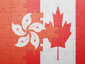 puzzle with the national flag of canada and hong kong
