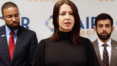 Abby Martin (center) delivers remarks on her lawsuit against Georgia Southern University. This week, a federal court found Georgia Southern violated Martin's rights when it withdrew a speaking invitation because of her pro-Palestine views. (Empire Files / YouTube.com)