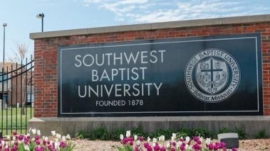 Sign at the entrance to Southwest Baptist University.