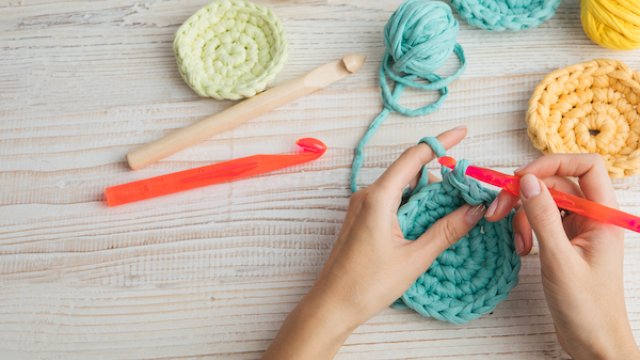 Hands knitting crochet