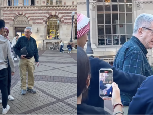 University of Southern California professor John Strauss speaks to protesters at a pro-Palestinian event on USC's campus.