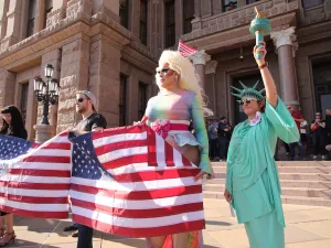 Drag performer and a woman dressed as the Statue of Liberty protest Donald Trump's policies at a No Kings rally at the Texas state capitol in Austin.