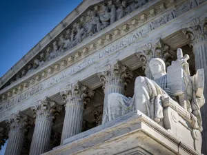 A summer day in front of the US Supreme Court Building in Washington, DC.