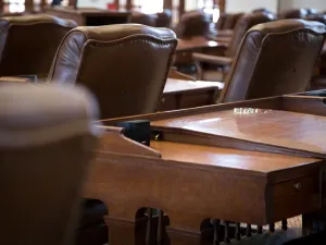 Empty seats inside the Texas Capitol building