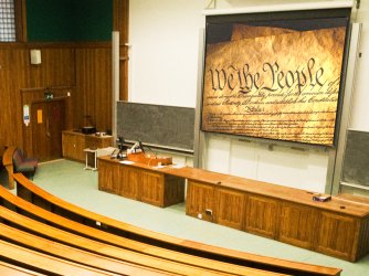College classroom with the constitution on the projector screen 