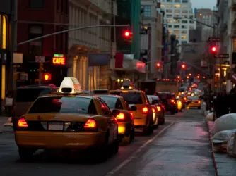 New York, USA - Several yellow taxi cabs wait in traffic, March 2011