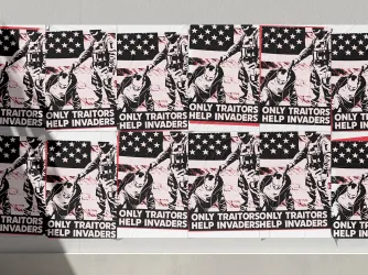 University Illinois Poster reading "Only Traitors Help Invaders"