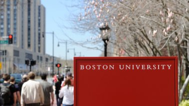 Boston University sign and crowd of students walking