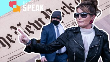 Sarah Palin, in leather jacket and sunglasses, gestures with New York Times in background