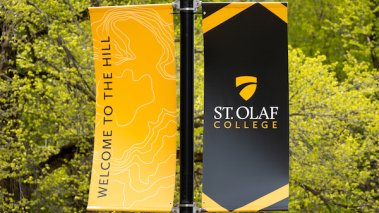 Banner and Logo on the campus of St. Olaf College
