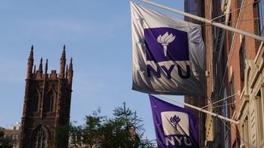 Banners hang on the NYU campus in New York