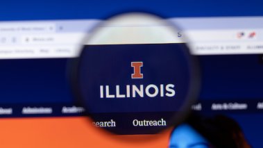 University of Illinois at Urbana-Champaign website homepage logo visible on display screen