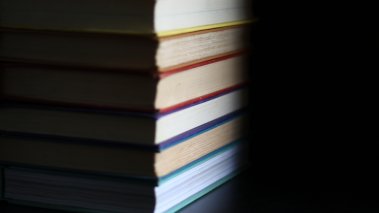 rainbow book pile banned books education