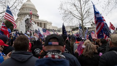 Supporters of former President Donald Trump surround the Capitol building on January 6, 2021