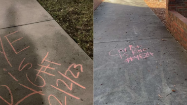 Chalk messages saying "Ye was right" on University of Florida sidewalks
