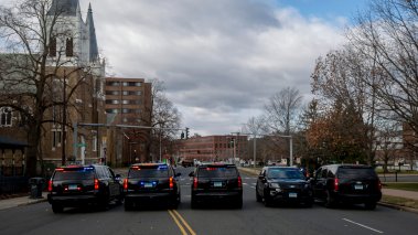 Police cars block a roadway in Hartford, Connecticut