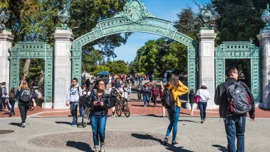 Students pass through Sather Gate on the University of California, Berkeley, campus.