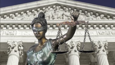 Lady justice against The Supreme court of U.S.