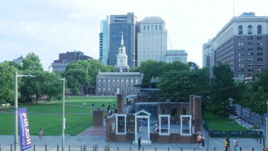 Independence Hall in the background and the Liberty Bell in the foreground in Philadelphia during the 2023 FIRE Student Network Summer Conference