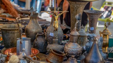 Brass and other metal objects including religious items sold at the flea market
