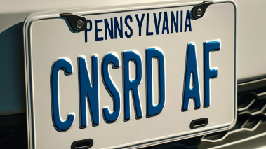 Pennsylvania license plate reading, "CNSRD AF"