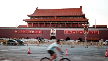 Famous Tiananmen Square in Beijing, China with view on Forbidden City and Mao Zedong picture at sunset