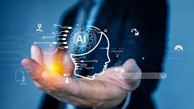 Human hand holding AI artificial intelligence virtual assistant chatbot concept