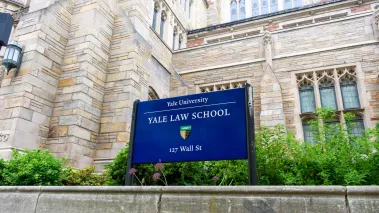 Yale Law School sign and coat of arms at Sterling Law Building in New Haven, Connecticut.