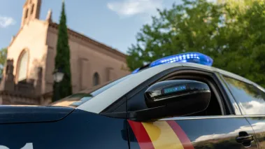Oct. 14, 2024 – Spanish police car is parked outside a church
