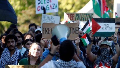 Protesters gather in response to the Palestine and Israel conflict, Thursday, Oct. 12, 2023, at Purdue University in West Lafayette, Indiana