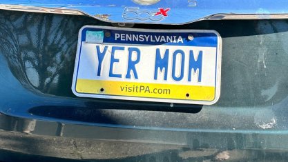 Pennsylvania license plate reading, "YER MOM"