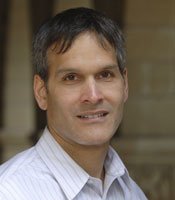 A headshot of UCLA professor John Villasenor.