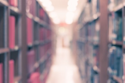 blurry library bookshelves