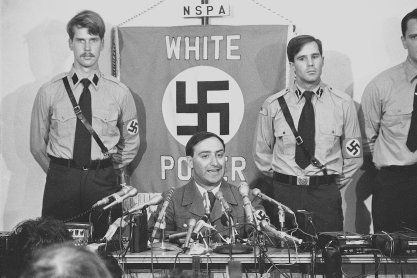 Frank Collin leader of the NAZI Party of America announces that the group has called off its planned march to suburban Skokie 