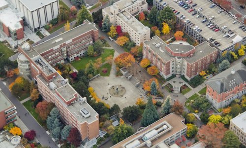 Aerial view of college campus buildings 