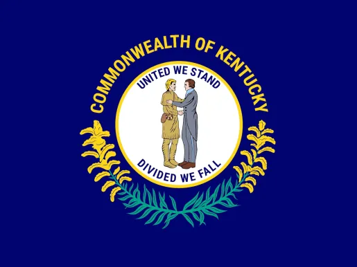 Kentucky flag with the words "Commonwealth of Kentucky" across the top and under that "United We Stand / Divided We Fall"
